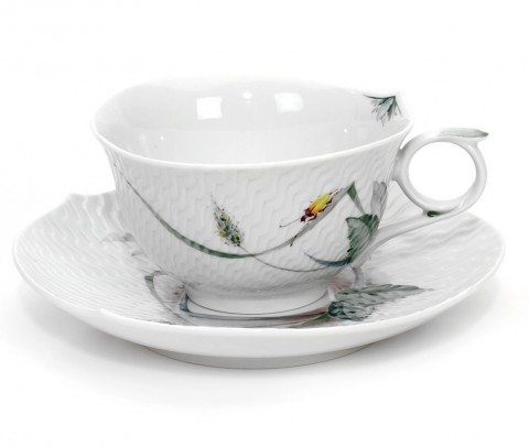 Taza de té con platillo Flora silvestre, forma Wellenspiel Relief